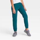 Girls' Stretch Woven Zip Pocket Jogger Pants - All In Motion Teal Xs, Girl's, Blue