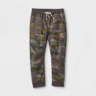 Toddler Boys' Jersey Lined Woven Jogger Pull-on Pants - Cat & Jack Camo Green
