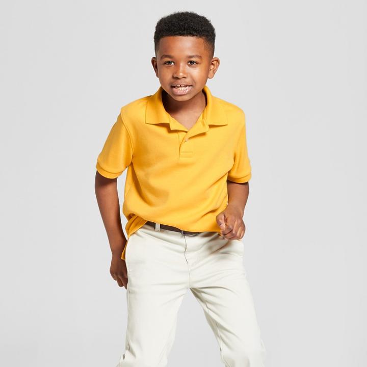 Boys' Short Sleeve Interlock Uniform Polo Shirt - Cat & Jack Mustard Yellow