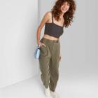Women's High-rise Pleated Tapered Pants - Wild Fable Olive Green