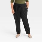Women's Plus Size High-rise Woven Ankle Jogger Pants - A New Day Black