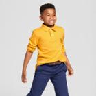 Boys' Long Sleeve Interlock Uniform Polo Shirt - Cat & Jack Mustard Yellow
