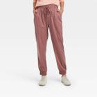 Women's High-rise Woven Ankle Jogger Pants - A New Day Light Purple