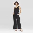 Women's Sleeveless Scoop Neck Knit Jumpsuit - A New Day Black