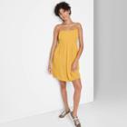 Women's Sleeveless Open Back Babydoll Dress - Wild Fable Mustard
