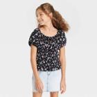 Girls' Puff Cap Sleeve Peplum Shirt - Art Class Black Floral
