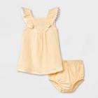 Baby Girls' Solid Sleeveless Dress - Cat & Jack Cream Newborn, Ivory