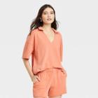 Women's Short Sleeve Collared French Terry Polo T-shirt - Universal Thread Peach Orange