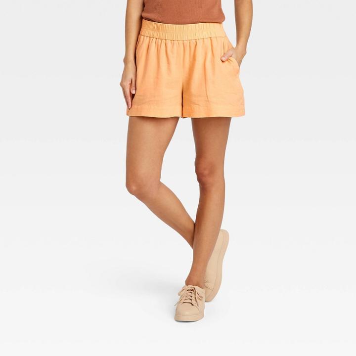 Women's High-rise Pull-on Shorts - A New Day Light Orange