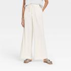 Women's Mid-rise Relaxed Fit Pants - A New Day Cream