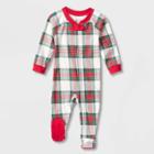 Baby Holiday Tartan Plaid Flannel Matching Family Footed Pajama - Wondershop Cream