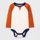 Baby Boys' Raglan Thermal Long Sleeve Bodysuit - Cat & Jack Orange Newborn