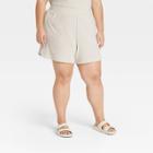 Women's Plus Size Mid-rise Pull-on Shorts - A New Day Tan