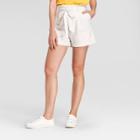 Women's Metallic Tie Waist Shorts - A New Day Cream/silver