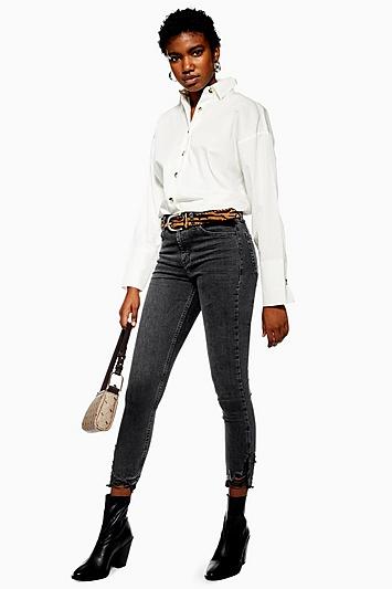 Topshop Petite Wash Black Ripped Hem Jamie Jeans
