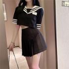 Set: Short-sleeve Sailor Collar Shirt + Pleated A-line Skirt