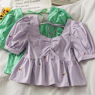 Embroidered Ruched Peplum Top
