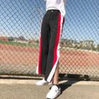 Embroidered Short-sleeve T-shirt / Buttoned Side Color Block Wide Leg Pants