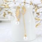 Non-matching Pearl Wings Earring