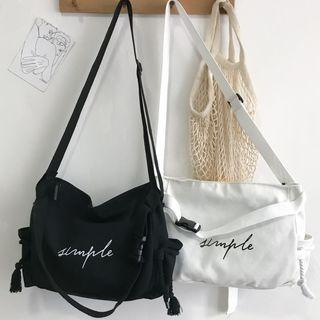 Letter Embroidered Buckled Canvas Crossbody Bag