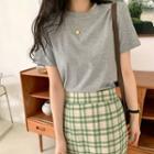 Short-sleeve Plain T-shirt / High-waist Plaid Midi Pencil Skirt