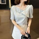 Asymmetrical Short-sleeve Ruffled Blouse