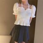 Cold-shoulder Ruffle Hem Blouse / Mini Pleated Skirt