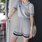 Set: Lettering Short-sleeve Knit Polo Shirt + Mini A-line Knit Pleated Skirt