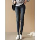 Elastic-waist Distressed Fleece-lined Skinny Jeans
