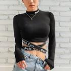 Long-sleeve Cross Letter Top