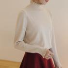 Mock-neck Frilled Knit Top