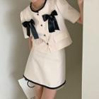Set: Short-sleeve Bow Blazer + A-line Mini Skirt