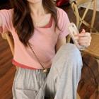Mock Two-piece Short-sleeve Asymmetric Cropped T-shirt