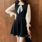 Long-sleeve Tie-neck A-line Mini Dress