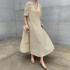 Plunge-neck Maxi Swing Dress