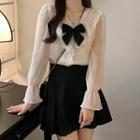 Long-sleeve Bow Lace Blouse / Mini A-line Skirt