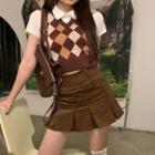 Short-sleeve Collared T-shirt / Argyle Sweater Vest / Mini A-line Skirt