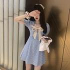 Plaid Bow Cutout Skinny Mini Dress