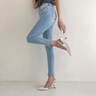 [the Denim] Cutout-hem Skinny Jeans