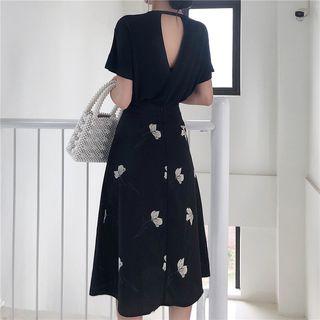 Plain Open-back Short-sleeve T-shirt / Floral High-waist Skirt