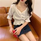 Ruffle V-neck Elbow-sleeve Blouse