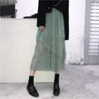 Long-sleeve Cut-out T-shirt / Midi A-line Mesh Skirt