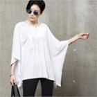 Pocket-front M Lange Poncho Top