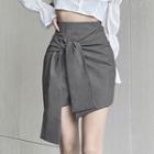 Asymmetrical Hem Tie-strap Mini Pleated Skirt