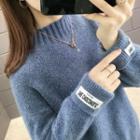 Letter Tag Sweater