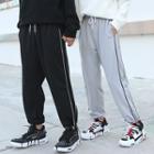 Couple Matching Striped Cropped Harem Pants