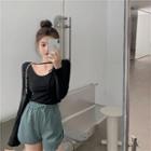 Set: Long-sleeve Paneled T-shirt + Sweatshorts