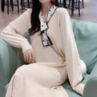 Tie-neck Ruffle Hem Knit Dress