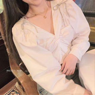 Long-sleeve Embellished Twist-front Blouse