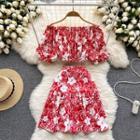 Set: Short-sleeve Off-shoulder Floral Crop Top + A-line Skirt